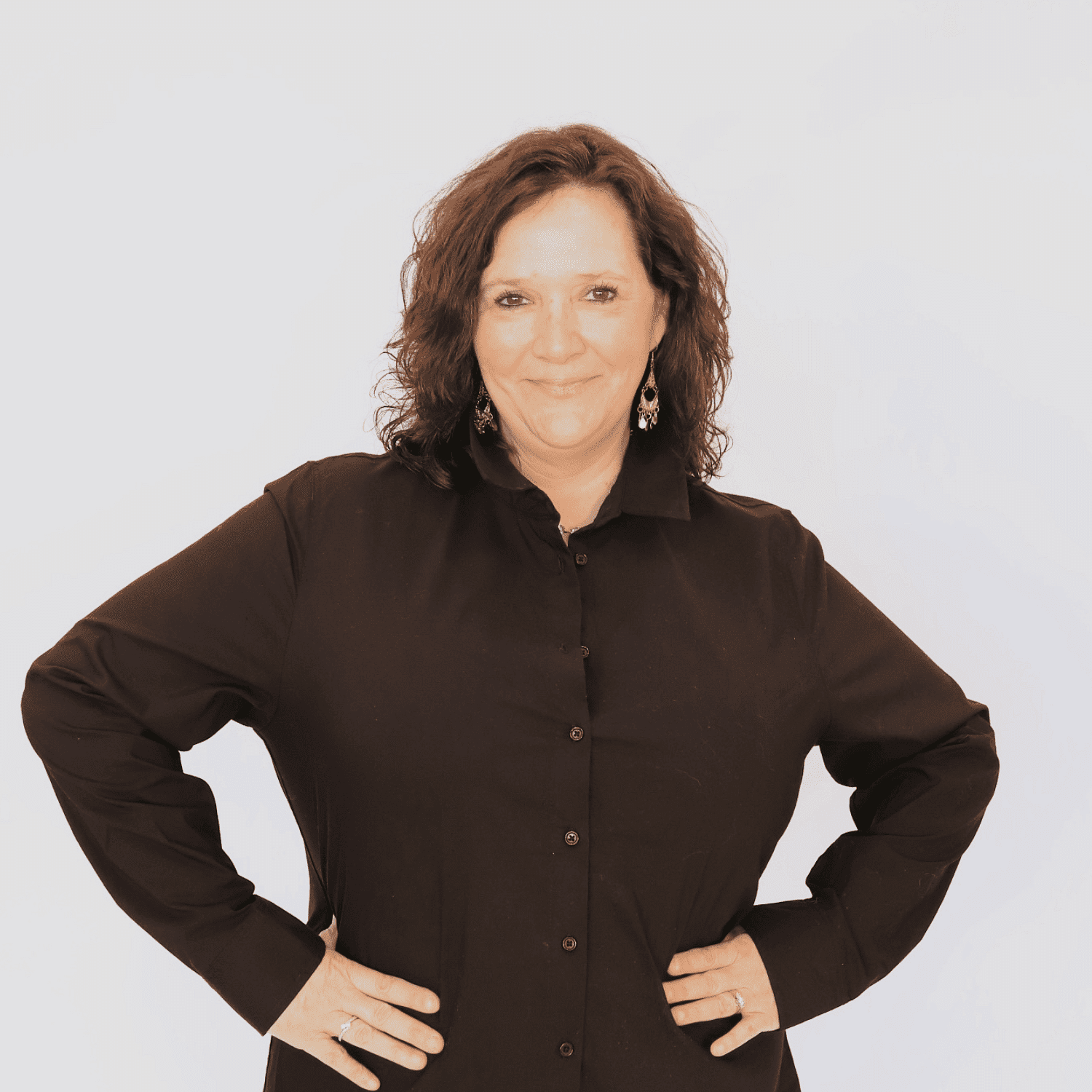 Portrait of Jolie, a professional stylist at Shairon's Salon, showcasing their expertise and style.